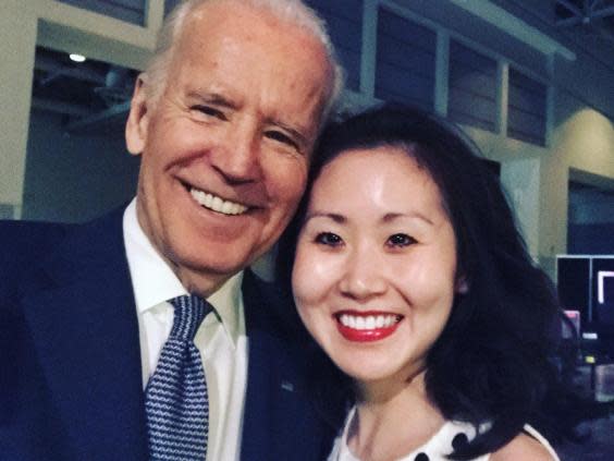 Former Young Democrat treasurer Lindy Li (pictured with Joe Biden) claims she was ousted for her anti-Bernie Sanders tweets (Lindy Li/Twitter)