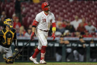 Cincinnati Reds' Joey Votto (19) watches his solo home run during the fifth inning of a baseball game against the Pittsburgh Pirates in Cincinnati, Monday, Sept. 20, 2021. (AP Photo/Aaron Doster)