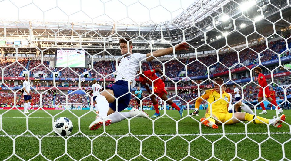 Gary the great: Cahill clears the ball off the line as Jordan Pickford has a worrying moment