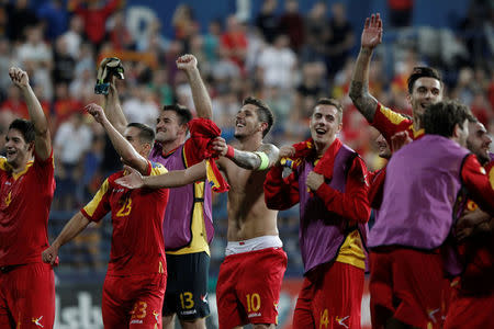 Soccer Football - 2018 World Cup Qualifications - Europe - Montenegro vs Romania - Podgorica, Montenegro - September 4, 2017 - Montenegro team celebrates. REUTERS/Stevo Vasiljevic