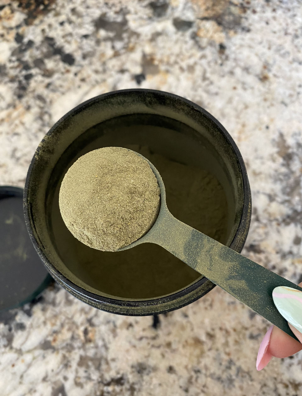 A scoop of Athletic Greens