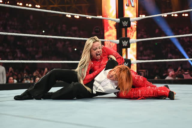 <p>WWE/Getty</p> WWE stars Liv Morgan and Becky Lynch