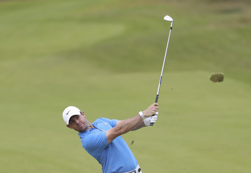 Northern Ireland's Rory McIlroy plays a shot on the 8th fairway during a practice round ahead of the start of the British Open golf championships at Royal Portrush in Northern Ireland, Tuesday, July 16, 2019. The British Open starts Thursday. (AP Photo/Peter Morrison)