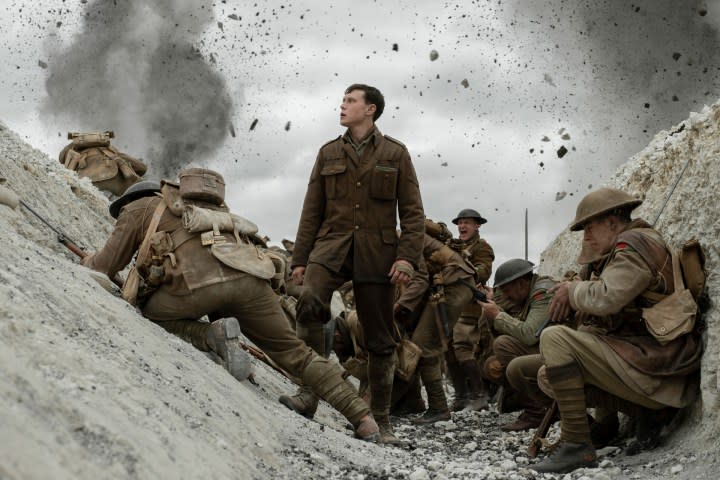 George MacKay as Schofield in a trench in a poster for "1917."