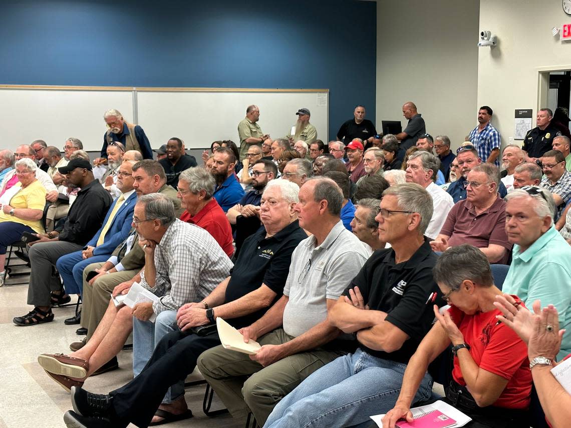 Firearm instructors and gun rights supporters attend a public meeting over new rules proposed by the N.C. Department of Justice’s Criminal Justice Standards Division at Wake Technical Community College on Wednesday, Aug. 9, 2023.