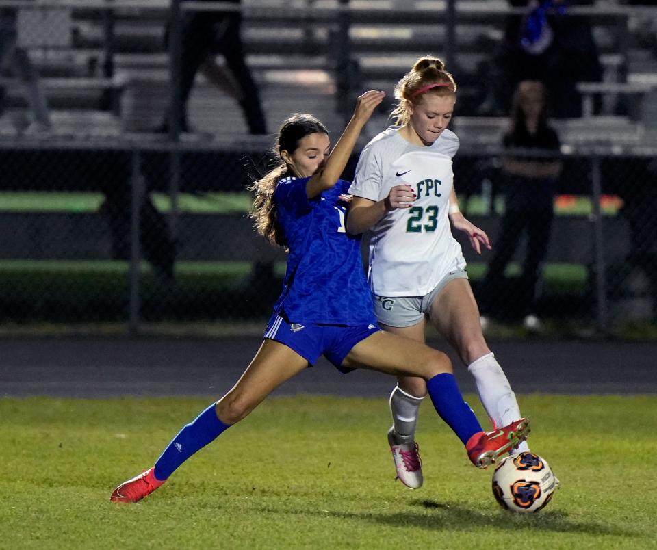 Flagler Palm Coast's Kaitlyn Steiner (23) attempts to get past Matanzas Kaylin Henthorn (17) during a match at Matanzas High School in Palm Coast, Tuesday, Dec.5, 2023.