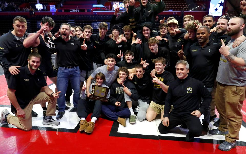 The Southern Regional wrestling team is shown celebrating after it won the NJSIAA Group 5 championship Sunday