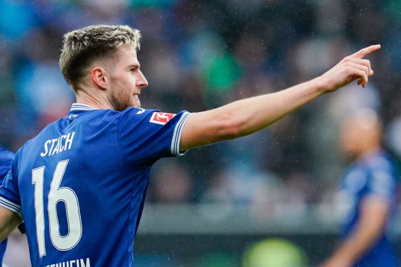 Hoffenheim's Anton Stach celebrates scoring his side's fourth goal during the German Bundesliga soccer match between TSG 1899 Hoffenheim and Borussia Monchengladbach at PreZero Arena. Uwe Anspach/dpa