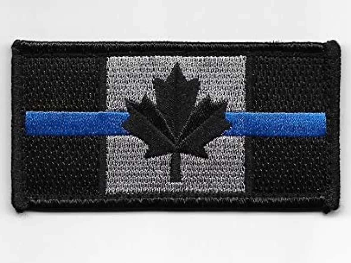 On-duty Calgary police officers are no longer permitted to wear these patches as of Thursday. (Amazon - image credit)