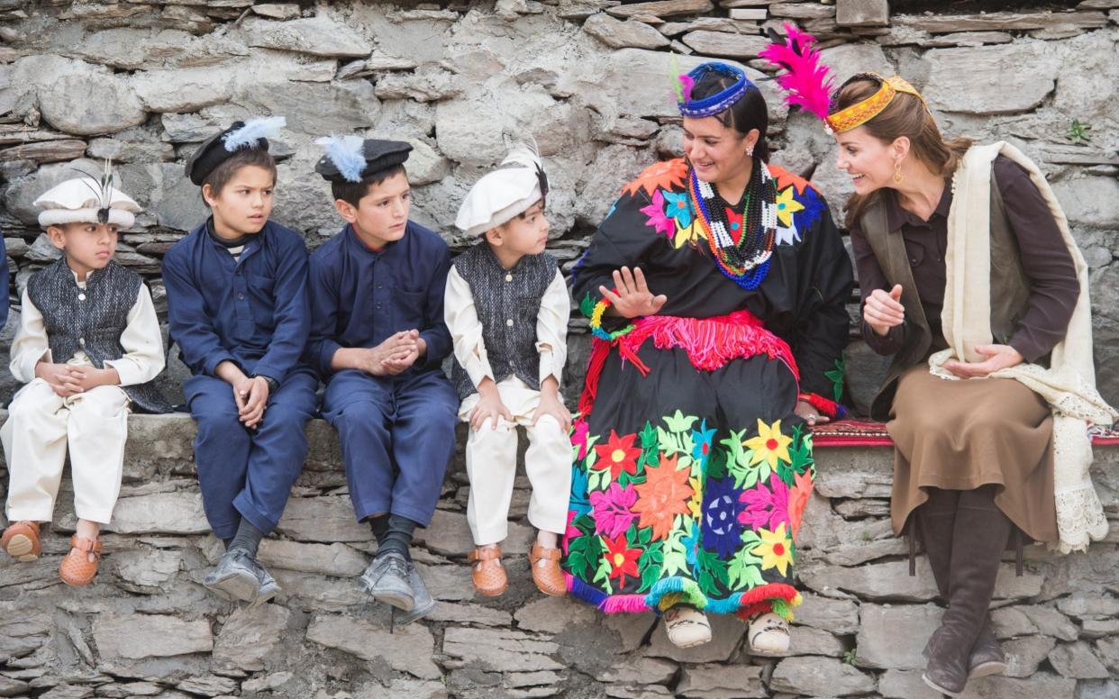 The Duchess of Cambridge meets little boys in Kalash - WireImage