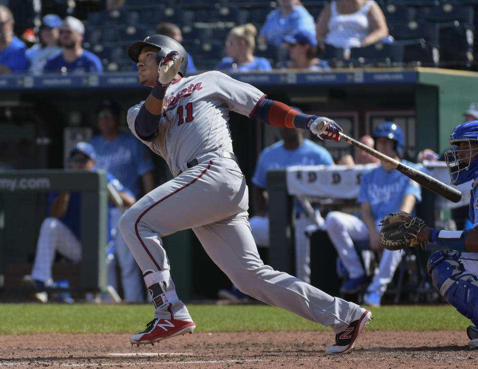 Minnesota Twins' Jorge Polanco hits a home run during the sixth inning of a baseball game against the Kansas City Royals in Kansas City, Mo., Sunday, Sept. 16, 2018. (AP Photo/Reed Hoffmann)