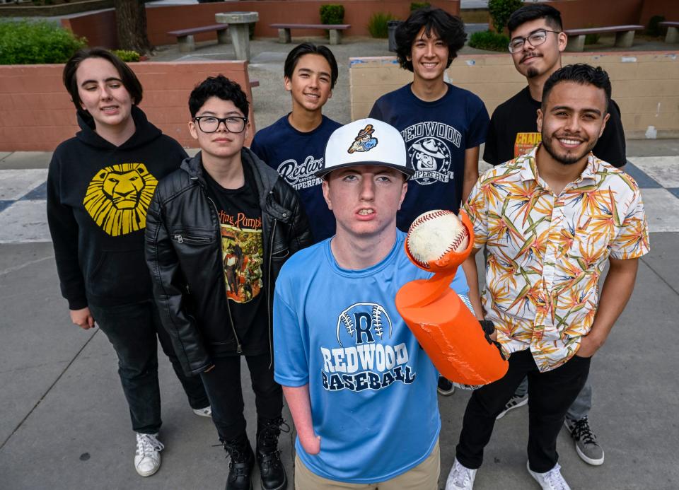 A group of engineering students at Redwood High School have designed and made a prosthetic hand for classmate Tyler Stark. He will throw out the first pitch Tuesday, May 9 against Mt. Whitney.