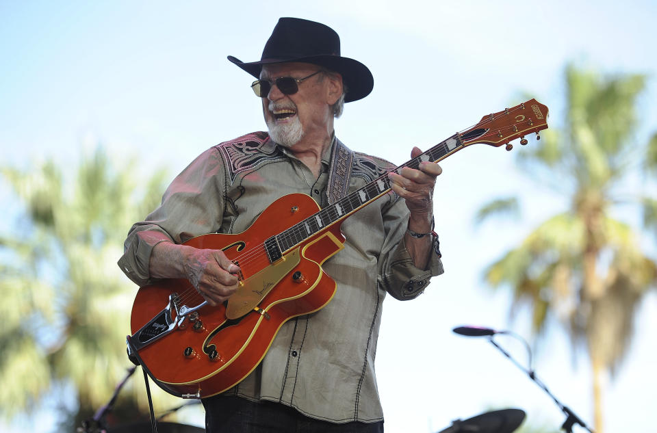 FILE - Duane Eddy performs on the third day of the 2014 Stagecoach Music Festival at the Empire Polo Field, April 27, 2014, in Indio, Calif. Eddy, a pioneering guitar hero whose reverberating electric sound on instrumentals such as "Rebel Rouser" and “Peter Gunn” helped put the twang in early rock 'n' roll and influenced George Harrison, Bruce Springsteen and countless other musicians, died of cancer Tuesday, April 30, 2024. He was 86. (Photo by Chris Pizzello/Invision/AP, File)