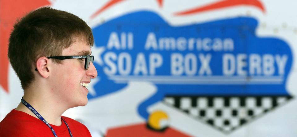 John Barr, 15, of Arlington, Mass., is all smiles as they discuss their love of derby racing during the third day of the All-American Soap Box Derby at Derby Downs on Wednesday.