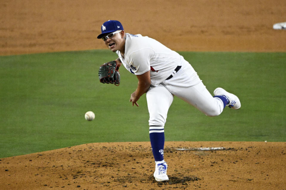 Los Angeles Dodgers starting pitcher Julio Urias throws to the plate during the second inning of an opening day baseball game against the Arizona Diamondbacks Thursday, March 30, 2023, in Los Angeles. (AP Photo/Mark J. Terrill)