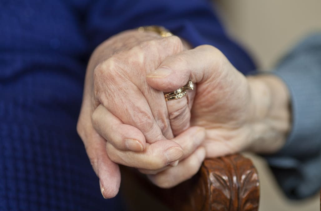 Hands of coupled married for over 50 years