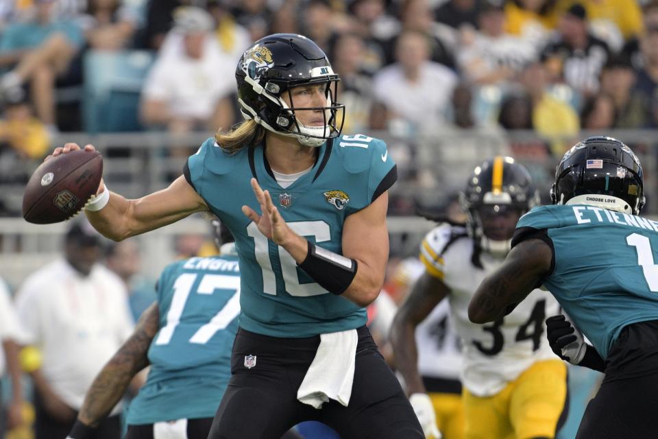 Jacksonville Jaguars quarterback Trevor Lawrence (16) looks for a receiver during the first half of an NFL preseason football game against the Pittsburgh Steelers, Saturday, Aug. 20, 2022, in Jacksonville, Fla. (AP Photo/Phelan M. Ebenhack)