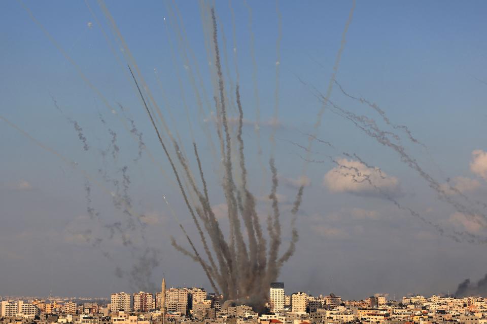 A salvo of rockets is fired by Palestinian militants from Gaza toward Israel on Oct. 10, 2023.