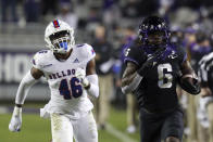 Louisiana Tech linebacker Ezekiel Barnett (46) pursues TCU running back Zach Evans (6) on a touchdown run in the third quarter during an NCAA college football game, Saturday, Dec. 12, 2020. (AP Photo/ Richard W. Rodriguez)