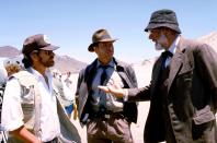 <p>Indiana Jones is an institution. The hat. The grin. The John Williams score. The movies are a spectacle—packed with adventure, humor, and some questionable ancient history. Forty years ago, on June 12, 1981, Indy hit theaters for the first time in <em>Raiders of the Lost Ark</em>. If the boulder chase in the opening sequence didn't get you, Indy's fear of snakes sure did. (He was also the <a href="https://www.esquire.com/style/mens-fashion/a25848350/indiana-jones-style-fashion-outfits/" rel="nofollow noopener" target="_blank" data-ylk="slk:most stylish archaeologist;elm:context_link;itc:0;sec:content-canvas" class="link ">most stylish archaeologist</a> to appear on the silver screen.) To mark the anniversary, here are 25 rarely-seen behind-the-scenes photos from all four of the movies. And in case you didn't know, there's another movie on the way (read all about it <a href="https://www.esquire.com/entertainment/movies/a36684645/indiana-jones-5-release-date-cast-plot-explained/" rel="nofollow noopener" target="_blank" data-ylk="slk:here;elm:context_link;itc:0;sec:content-canvas" class="link ">here</a>). </p>