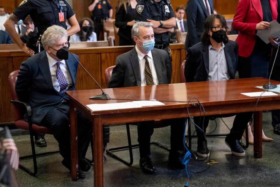 Glenn Horowitz (left), Craig Inciardi and Edward Kosinski appear in criminal court after being indicted for conspiracy involving handwritten notes from the famous Eagles album (John Minchillo/AP) (AP)