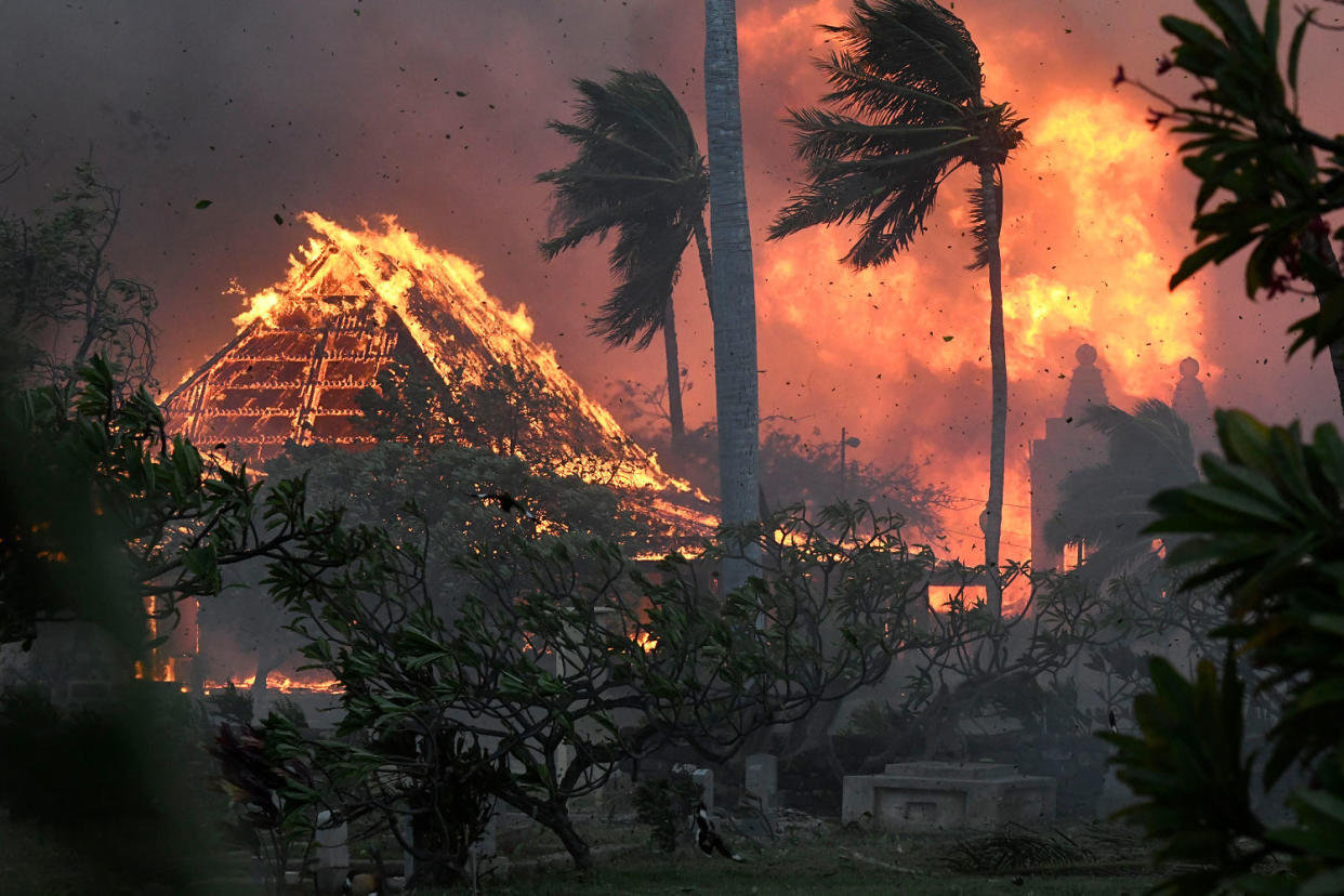 The hall of historic Waiola Church and nearby Lahaina Hongwanji Mission engulfed in flames (Matthew Thayer / The Maui News via AP file)