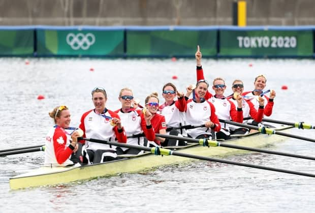 The Canadian women's eight rowing crew poses with their gold medals during the Tokyo Olympics. (Leon Neal/Getty Images - image credit)