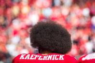 FILE PHOTO: San Francisco 49ers quarterback Colin Kaepernick prepares to take the field before an NFL game against the Tampa Bay Buccaneers at Levi's Stadium in Santa Clara