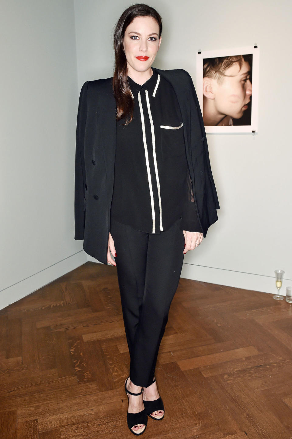 <p><strong>27 June</strong> Liv Tyler attended the launch event wearing an all-black ensemble with a bold red lip. </p>