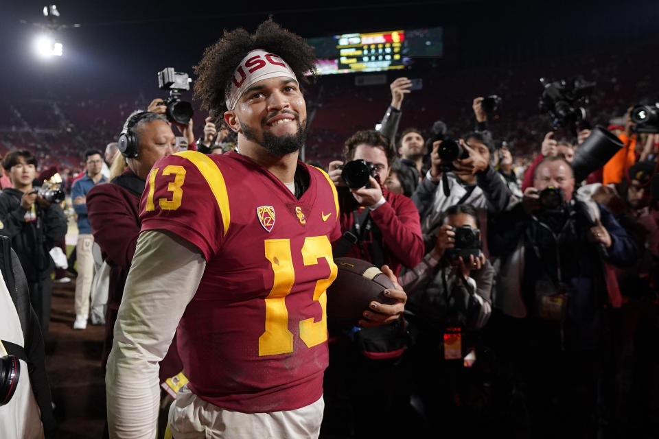 Southern California quarterback Caleb Williams smiles after USC defeated Notre Dame 38-27 an NCAA college football game Saturday, Nov. 26, 2022, in Los Angeles. (AP Photo/Mark J. Terrill)