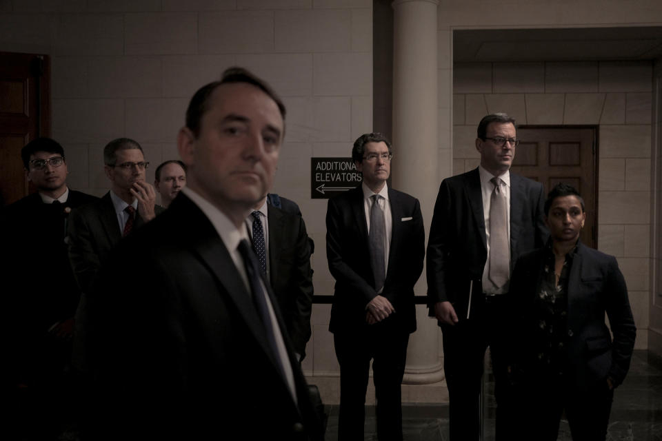 Staff members of House Judiciary Chairman Jerry Nadler (D-N.Y.) watch as he speaks to reporters at a press conference following the passage of the articles of impeachment in the Judiciary Committee to the House floor on Capitol Hill in Washington, D.C., on Dec. 13, 2019. | Gabriella Demczuk for TIME