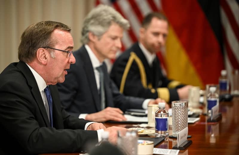 Boris Pistorius (L), German Minister of Defense, sits in a meeting with his US counterpart (not pictured). The Minister is meeting his counterparts, diplomats and officers during his military policy trip. Britta Pedersen/dpa