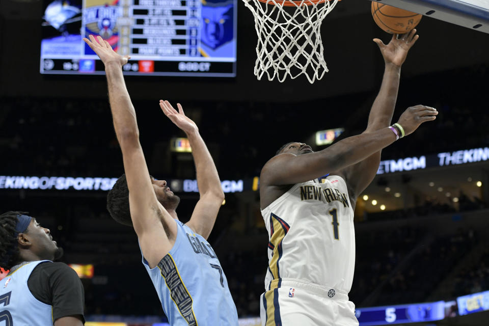 New Orleans Pelicans forward Zion Williamson shoots ahead of Memphis Grizzlies forward Santi Aldama (7) in the first half of an NBA basketball game, Monday, Feb. 12, 2024, in Memphis, Tenn. (AP Photo/Brandon Dill)