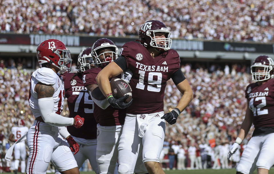 Oct 7, 2023; College Station, Texas; Texas A&M Aggies tight end Jake Johnson (19) celebrates after scoring a touchdown during the second quarter against the Alabama Crimson Tide at Kyle Field. Troy Taormina-USA TODAY Sports