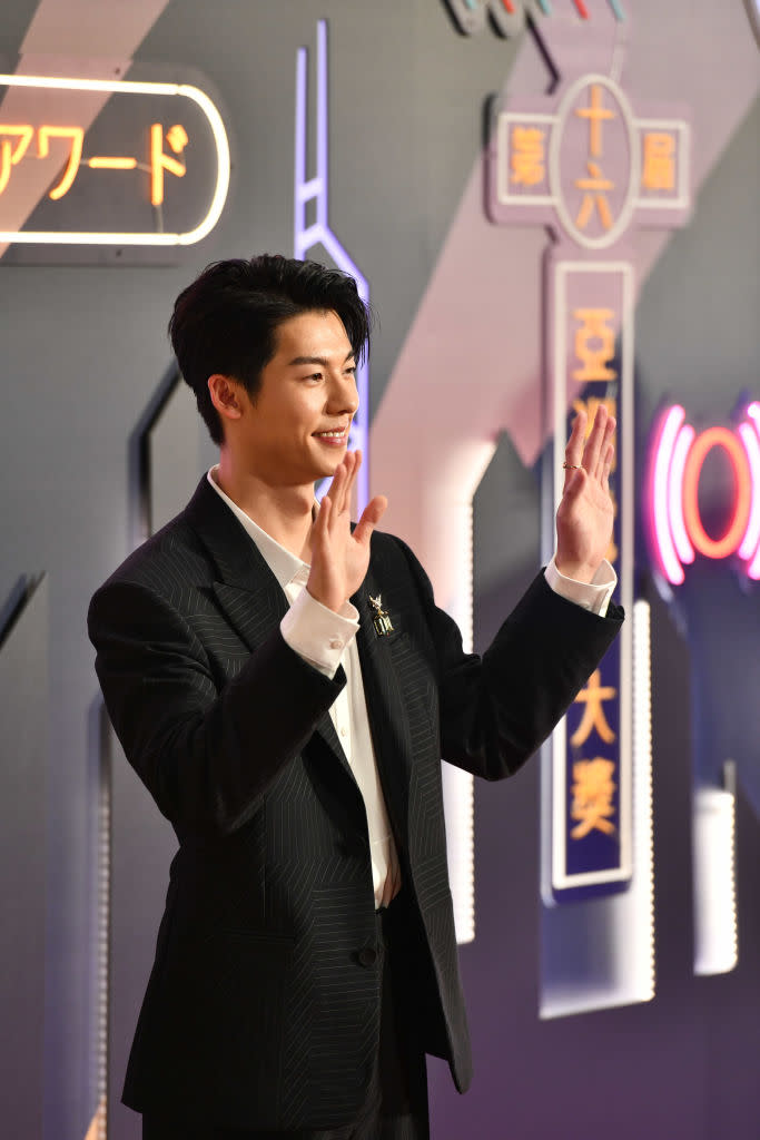 HONG KONG, CHINA - MARCH 12: Actor Greg Hsu Kuang-han arrives at the red carpet during the 16th Asian Film Awards at Hong Kong Palace Museum on March 12, 2023 in Hong Kong, China. (Photo by VCG/VCG via Getty Images)