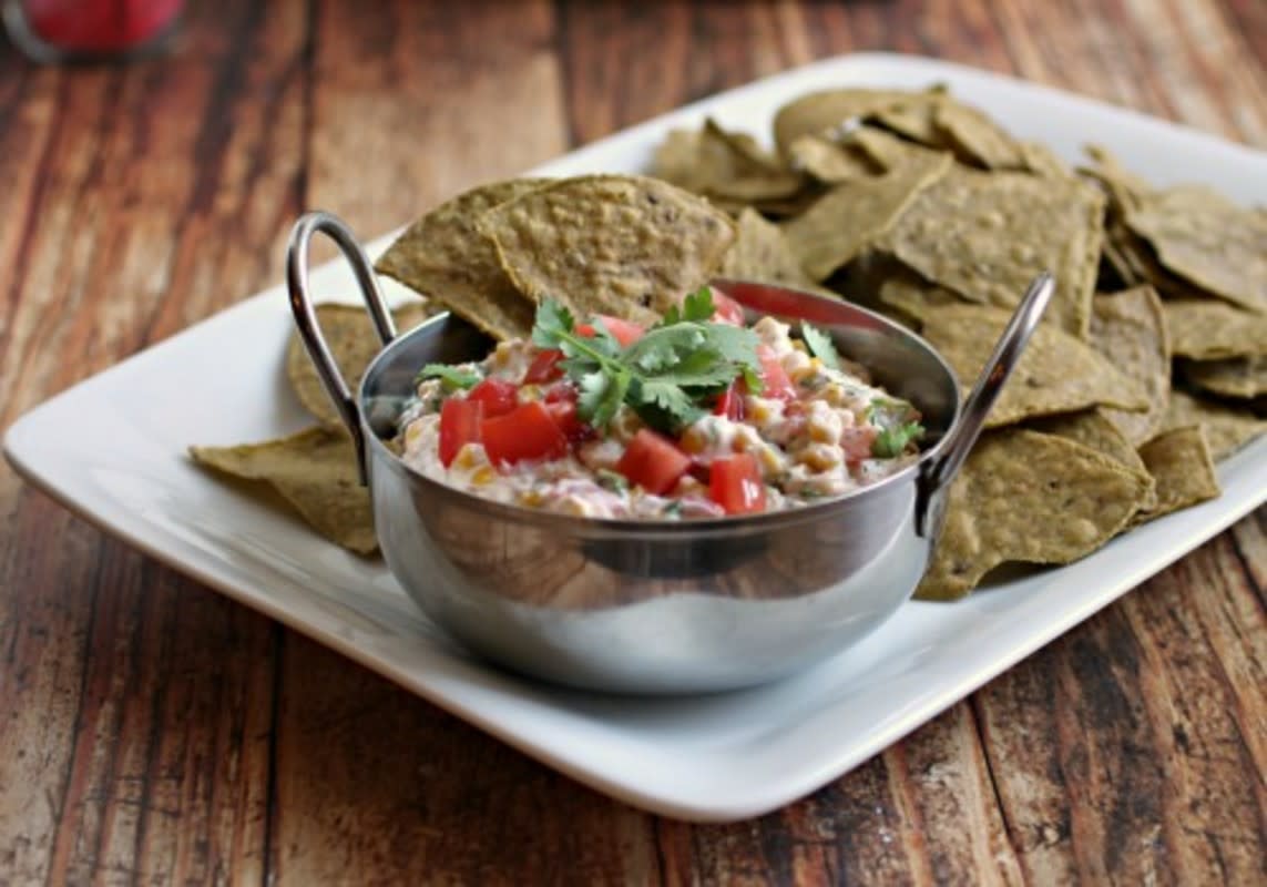 <p>Hungry Couple</p><p>Inspired by Mexican street corn, this Tex-Mex Corn Dip is anything but boring and will disappear in minutes. </p><p><strong>Get the recipe: <a href="http://www.hungrycouplenyc.com/2015/06/tex-mex-corn-dip.html" rel="nofollow noopener" target="_blank" data-ylk="slk:Tex-Mex Corn Dip;elm:context_link;itc:0;sec:content-canvas" class="link rapid-noclick-resp">Tex-Mex Corn Dip</a></strong></p>