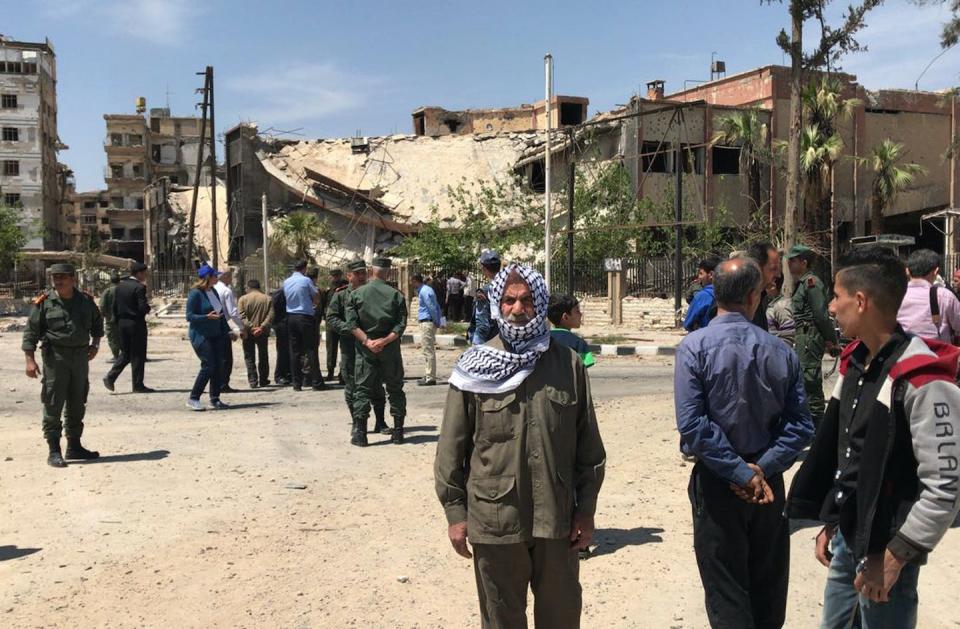 Damaged buildings in the town of Douma, the site of a suspected chemical weapons attack, near Damascus, Syria, in April 2018. <a href="https://newsroom.ap.org/detail/Syria/139a58728d5545d1a9683b02f12a8743/photo?Query=chemical%20weapons%20syria%20civilians&mediaType=photo&sortBy=&dateRange=Anytime&totalCount=149&currentItemNo=2" rel="nofollow noopener" target="_blank" data-ylk="slk:AP Photo/Hassan Ammar;elm:context_link;itc:0;sec:content-canvas" class="link ">AP Photo/Hassan Ammar</a>