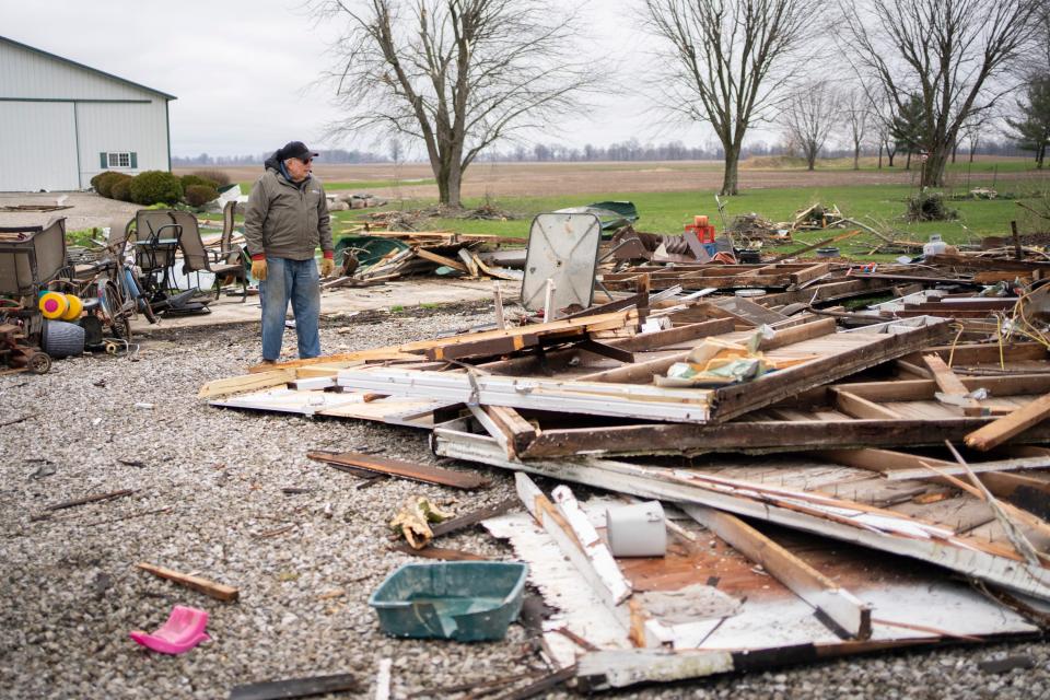 Francis McNamara of McNamara Farms surveys the damage to four different barns damaged on his property on Berlin Station Road in Berlin Township that were struck March 14 by what the National Weather Service rated as an EF1 tornado. The tornado caused extensive damage to homes and other structures along Berlin Station Road and in Delaware County before traveling into northern Licking County. It was one of eight tornadoes in the outbreak that struck Ohio that night.