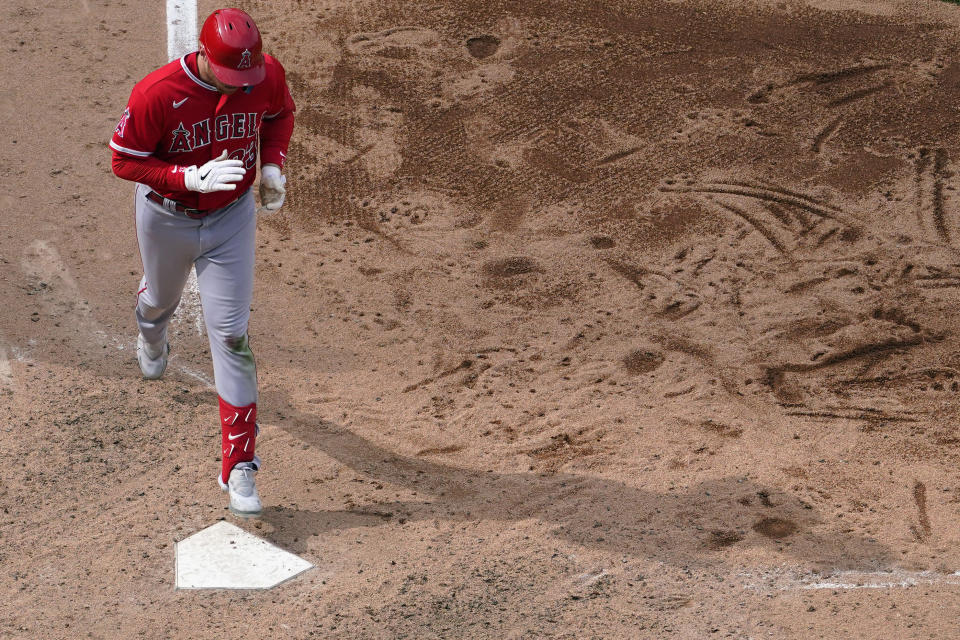 Los Angeles Angels' Brandon Drury crosses home after hitting a two-run home run against Philadelphia Phillies pitcher Craig Kimbrel during the ninth inning of a baseball game, Wednesday, Aug. 30, 2023, in Philadelphia. (AP Photo/Matt Slocum)