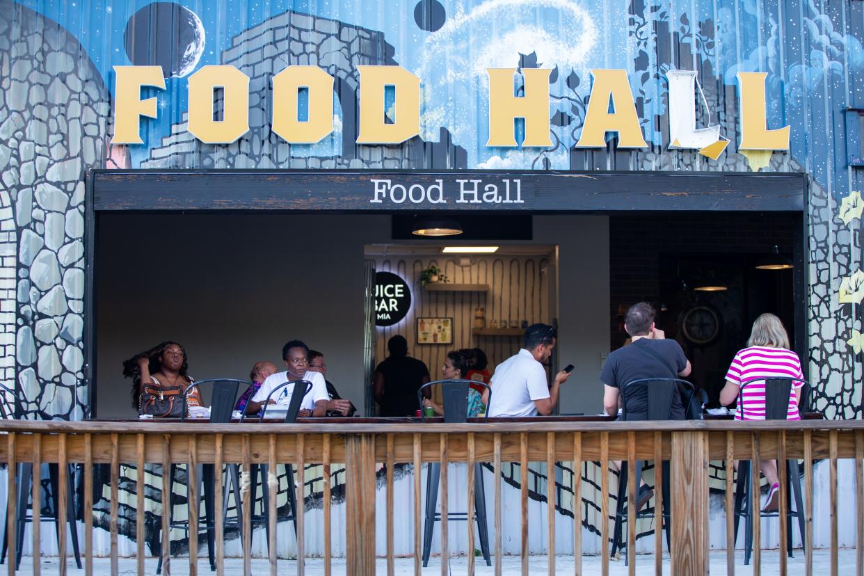 People enjoyed a hot evening in Railroad Square as they supported local businesses following the tornadoes that tore through Tallahassee on May 10, during the monthly event, First Friday on June 7, 2024.