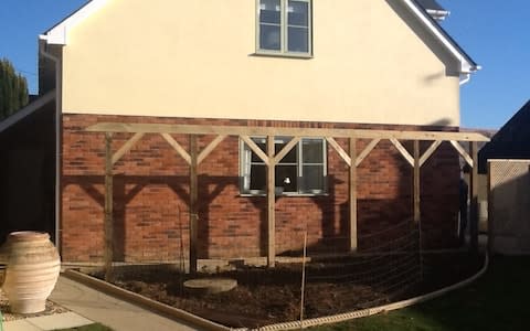 Janice Sayers' pergola is ready to be planted up - but what climber should she choose? - Credit: Janice Sayers