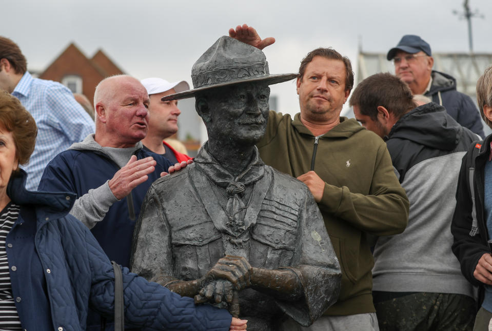 Local residents show their support for a statue of Robert Baden-Powell on Poole Quay in Dorset ahead of its expected removal to "safe storage" following concerns about his actions while in the military and "Nazi sympathies". The action follows a raft of Black Lives Matter protests across the UK, sparked by the death of George Floyd, who was killed on May 25 while in police custody in the US city of Minneapolis.