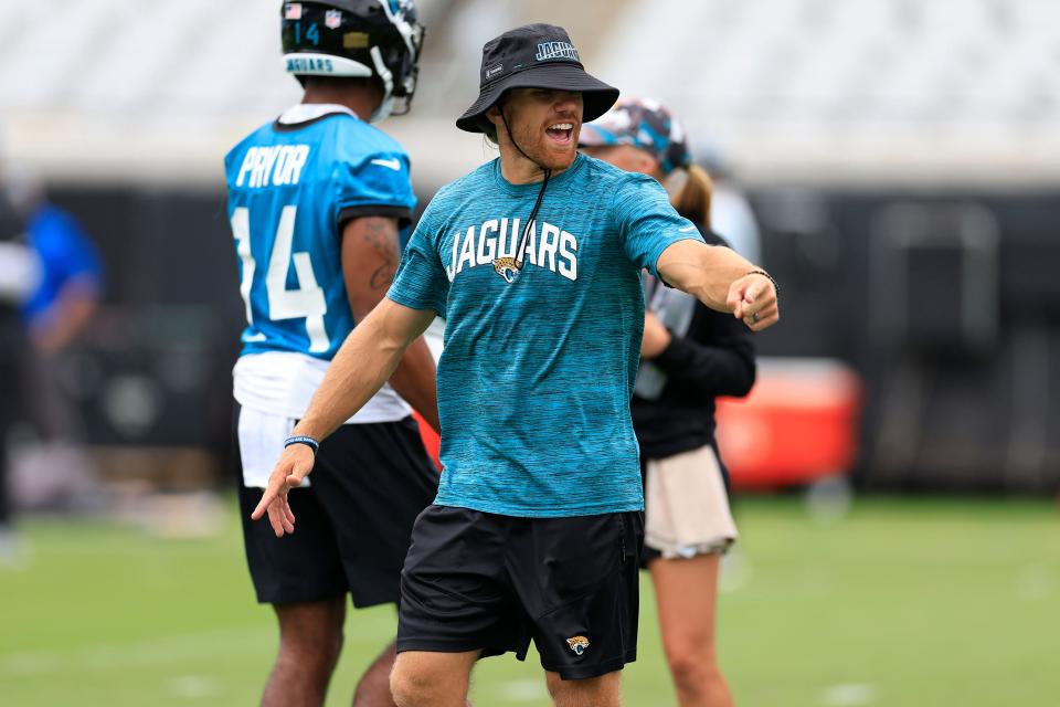 Jaguars wide receivers coach Chad Hall talks to players during the first day of a mandatory minicamp on June 12 at TIAA Bank Field.