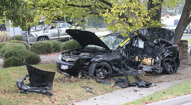 The couple had been married for 12 months and were in this Holden Commodore. They both died. Source: AAP