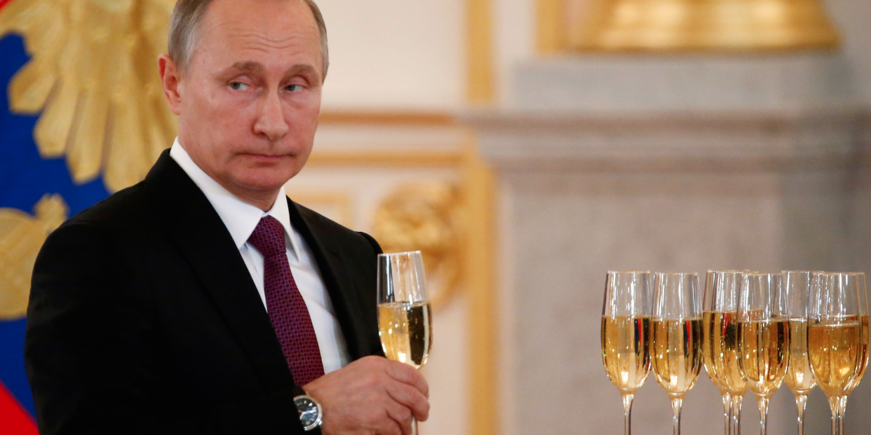 Russia's President Vladimir Putin holds a glass during a ceremony of receiving diplomatic credentials from foreign ambassadors at the Kremlin in Moscow, Russia. - Copyright: Reuters/Sergei Karpukhin