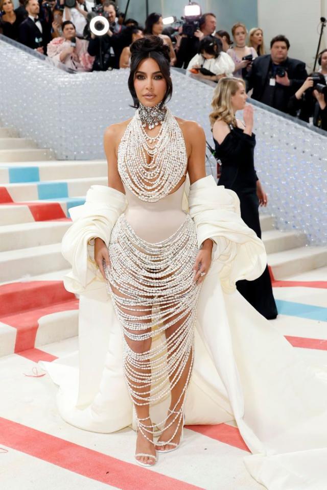 Kim Kardashian Returns To The Met Gala 2023 In Pearl-Adorned Naked Dress