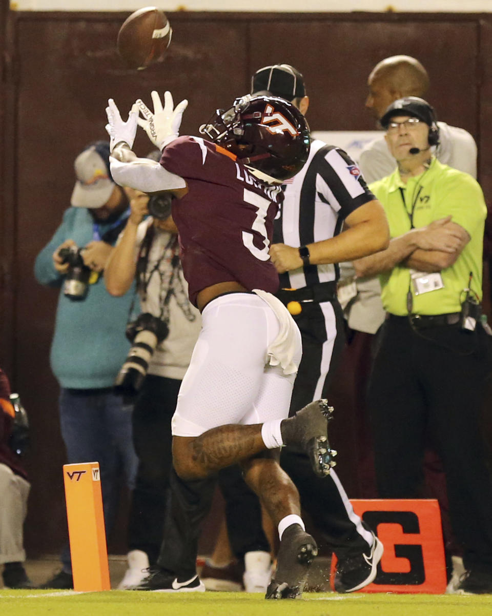 Virginia Tech's Da'Wain Lofton (3) reaches for a pass that fell incomplete at the goal line from quarterback Grant Wells, during the first half against West Virginia in an NCAA college football game Thursday, Sept. 22, 2022, in Blacksburg, Va. (Matt Gentry/The Roanoke Times via AP)