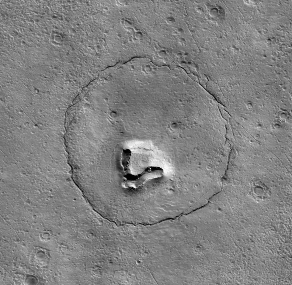 NASA captured a satellite image of Mars that appears to show an adorable bear's face on the red planet.  / Credit: NASA/JPL-Caltech/UArizona