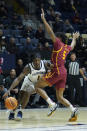 California guard Joel Brown (1) drives to the basket while defended by Southern California guard Boogie Ellis (5) during the first half of an NCAA college basketball game in Berkeley, Calif., Wednesday, Nov. 30, 2022. (AP Photo/Godofredo A. Vásquez)