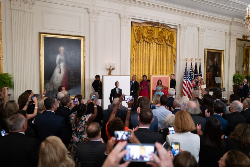 Former President Barack Obama and former first lady Michelle Obama unveil their official White House portraits. (Photo: Cheriss May for theGrio)